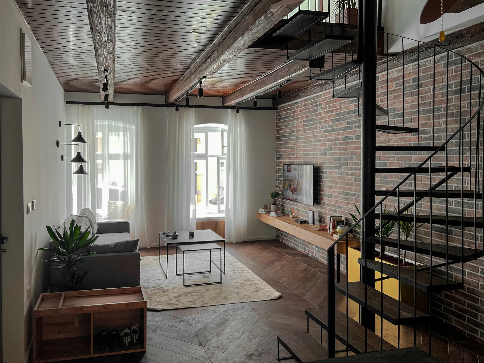 Open-plan living and kitchen of Petra's Loft