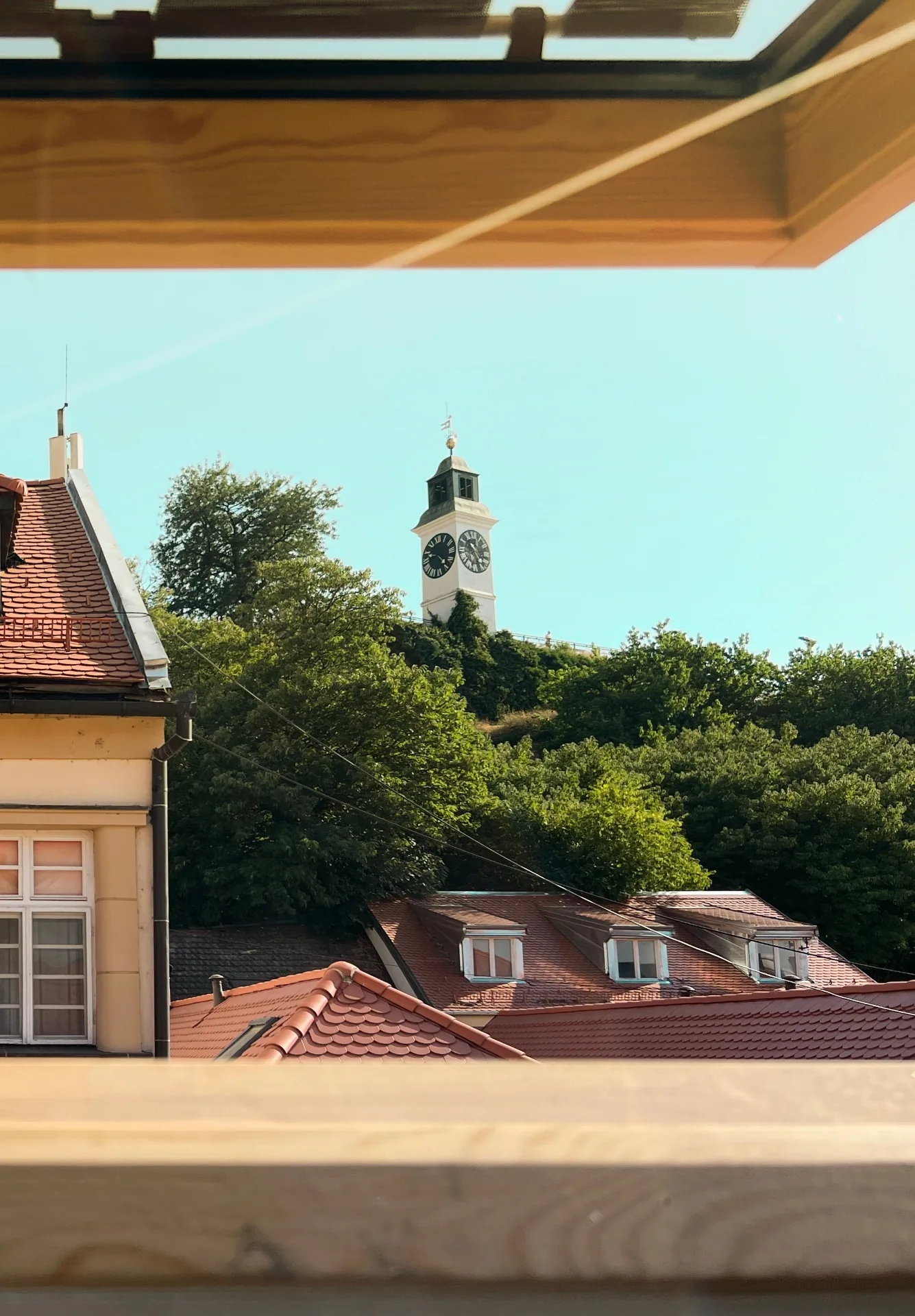 Skylight view towards Petrovaradin Fortress from an artist’s upper room